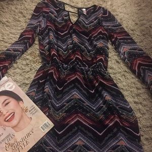 Long sleeve bohemian inspired dress.